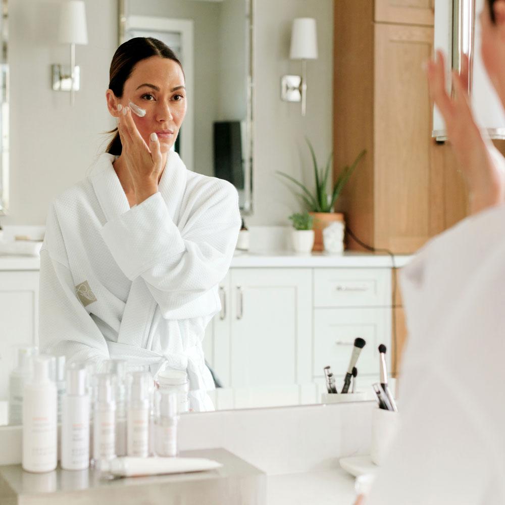 Woman applying Kerstin Florian Clarifying Starter Trio